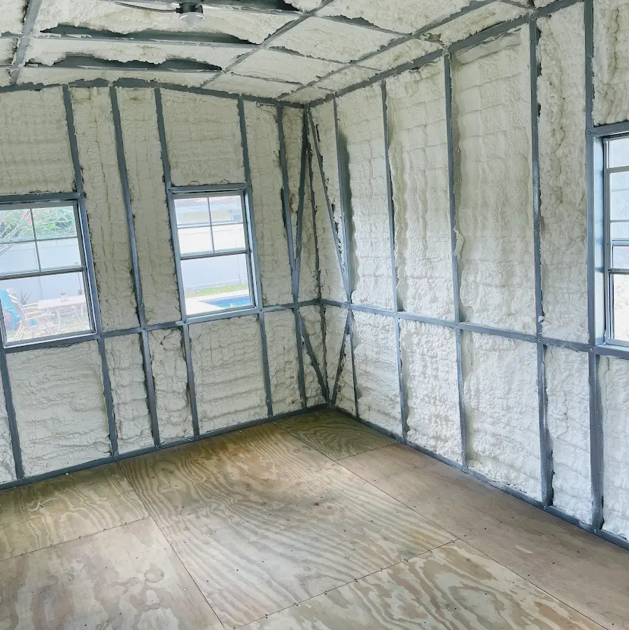 Closed-cell spray foam insulation applied to wall cavities in a residential project in Morton
